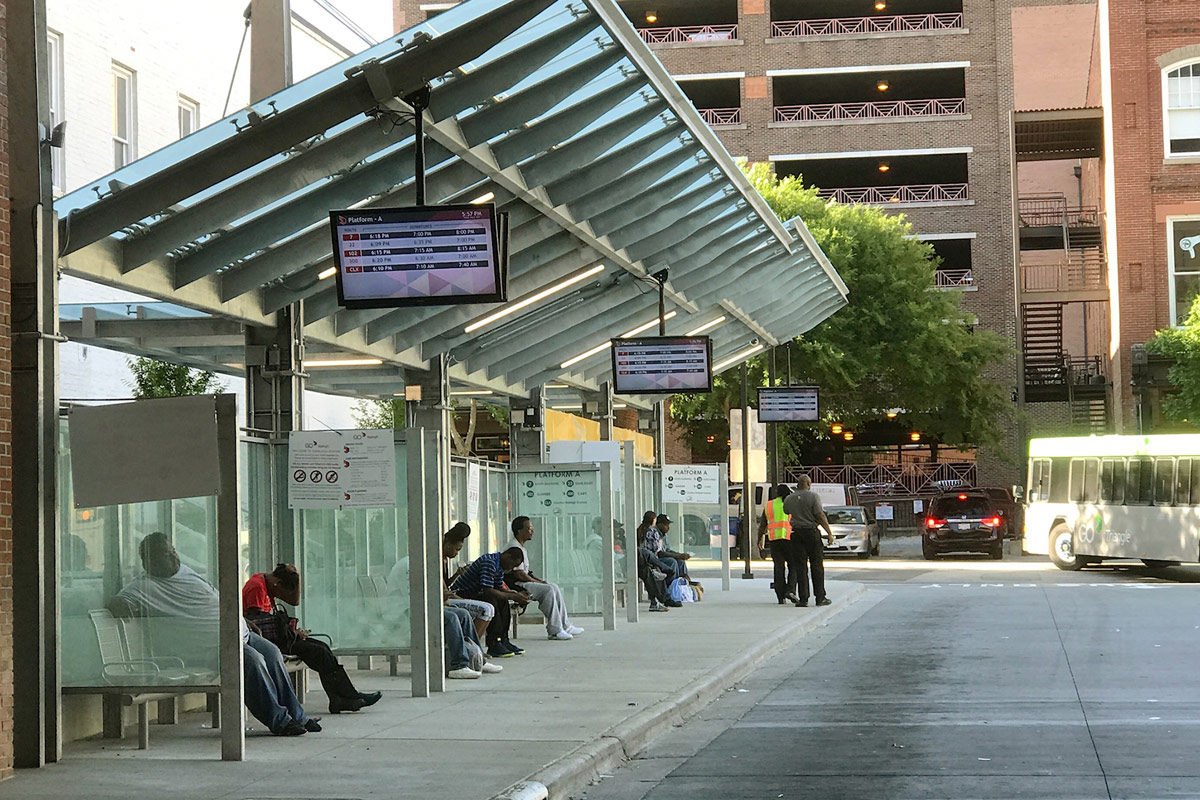 Image of digital signage at a bus station. 